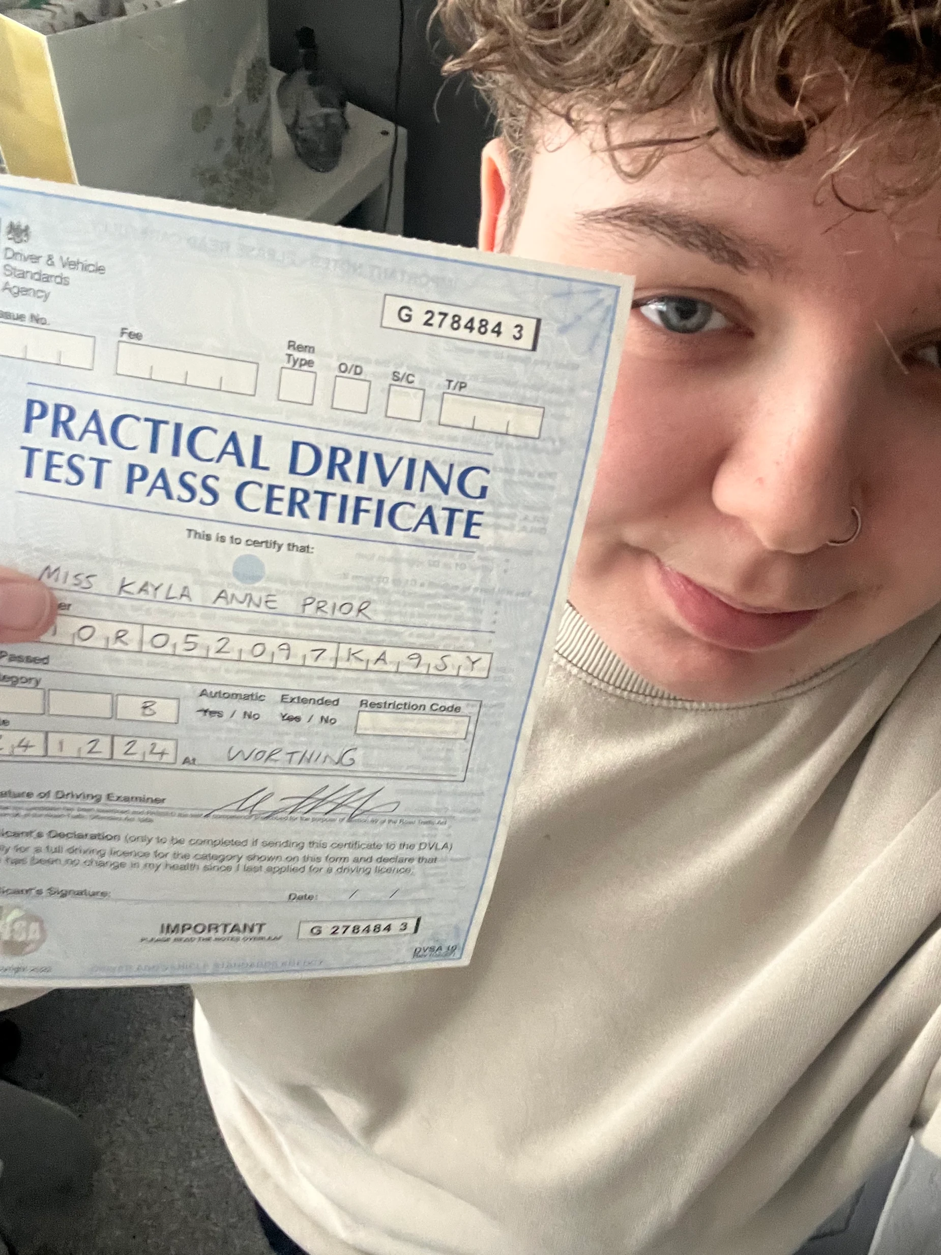 Kayla, a pupil who passed with Leroy